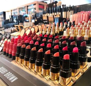 assortment of red and pink shades of lipstick