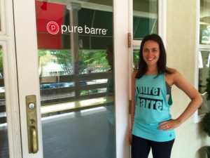 Pure Barre owner outside the store front