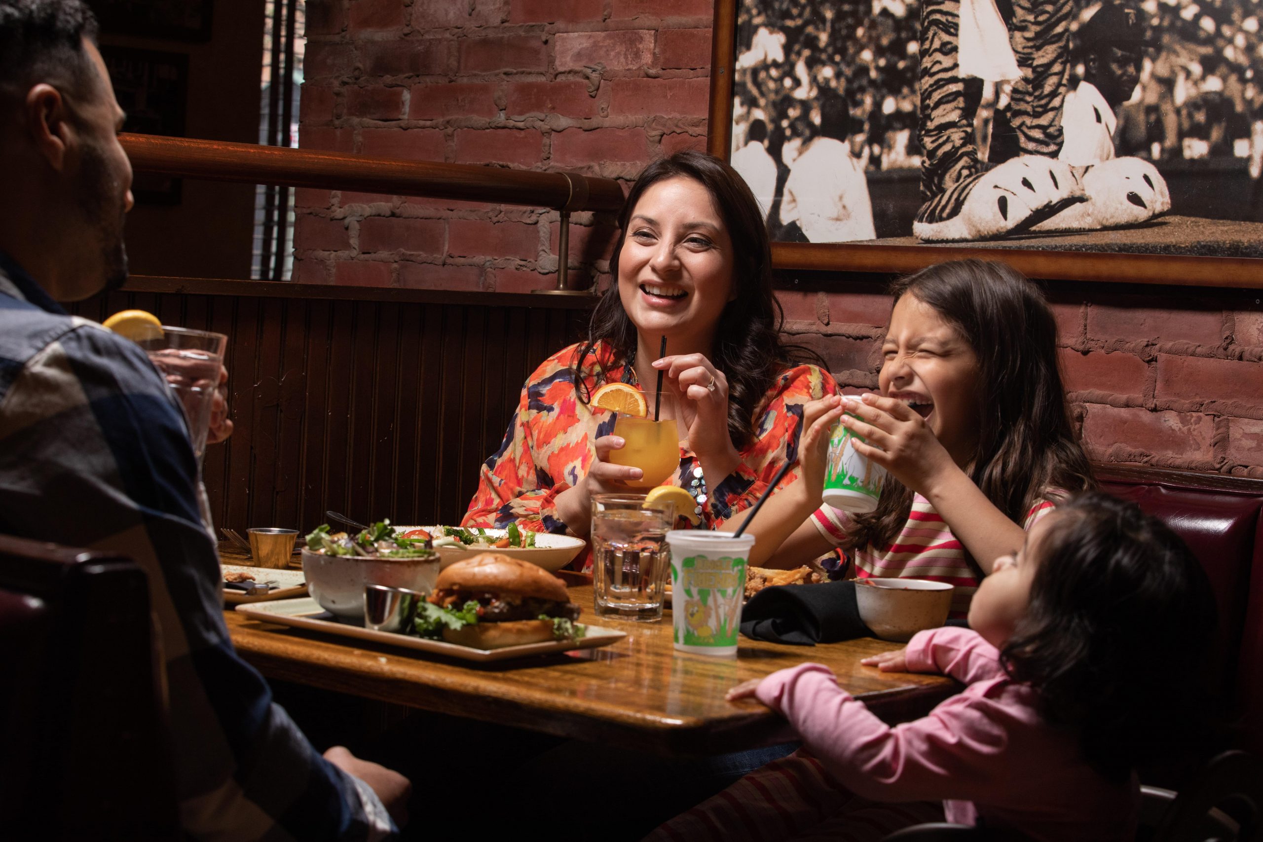 family dining in a booth