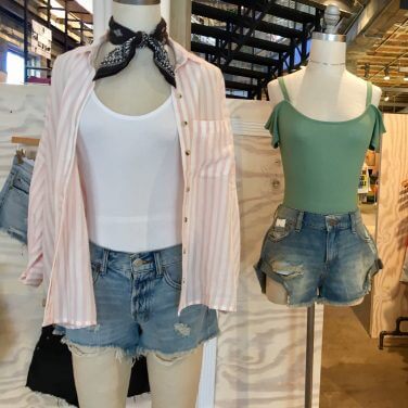 urban outfitters jean shorts and cami's on mannequins